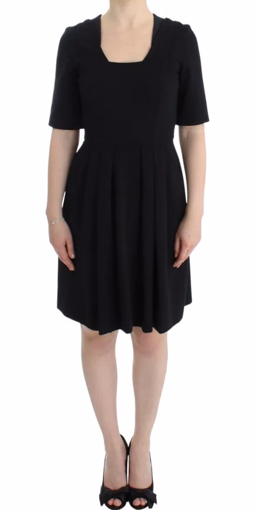 CO|TE Black short sleeve venus dress